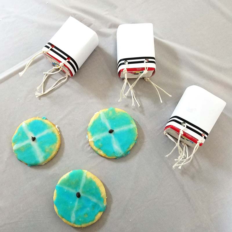These kippah cookies and tzitzis juice box upsherin treats are so cute! They are adorable for a Jewish third birthday party for boys!