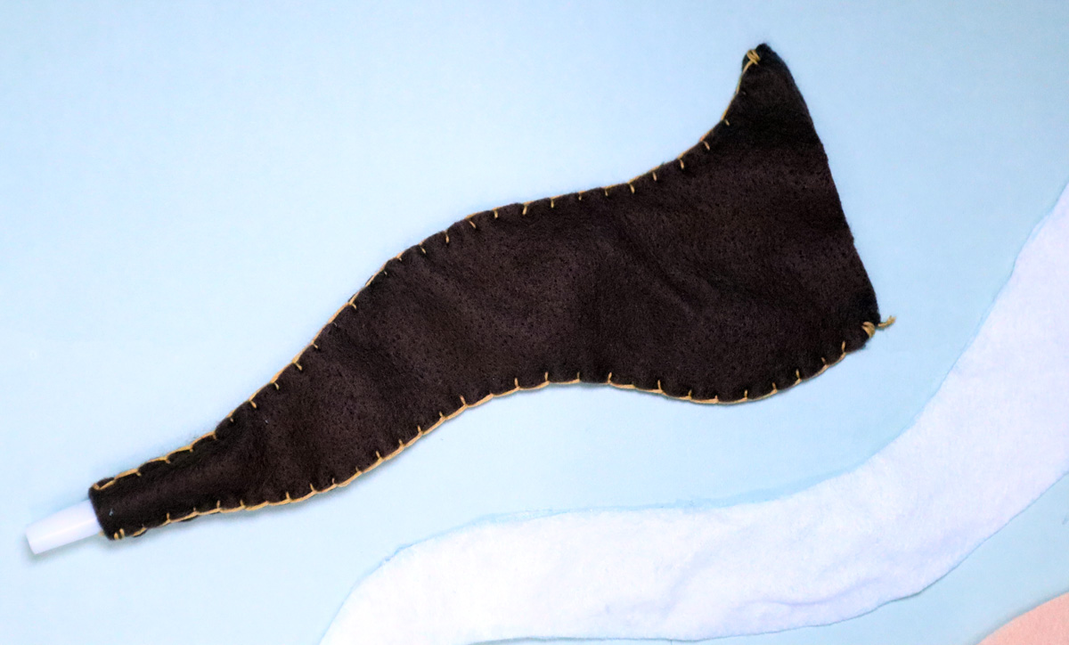 detailed shot of the DIY toy shofar from felt with stitching