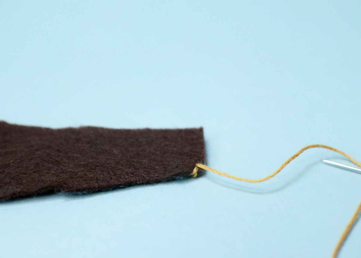 stitching the two felt pieces together